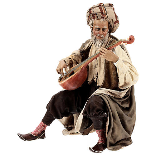 Músico com instrumento terracota para Presépio Angela Tripi com figuras de altura média 30 cm 3