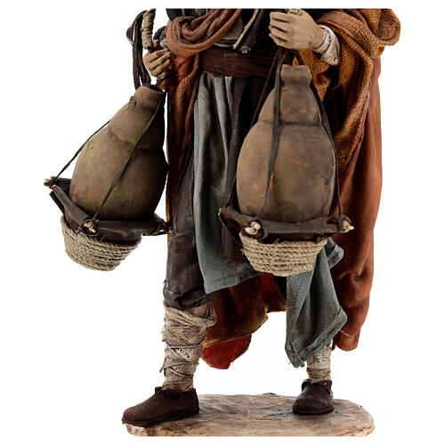 Man carrying jugs around neck 30 cm, Angela Tripi nativity 8