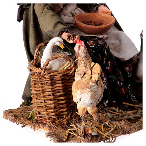 Woman sitting with a chicken for Tripi's Nativity Scene of 30 cm 8