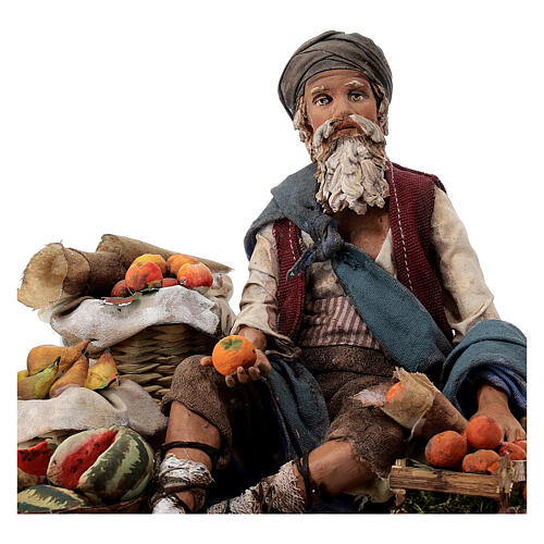 Fruit salesman sitting down for Tripi's Nativity Scene with 18 cm terracotta characters 2
