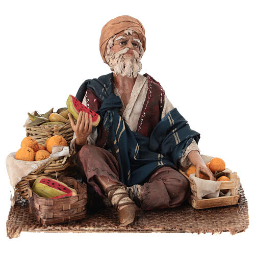 Vendedor de fruta sentado belén 18 cm Angela Tripi terracota 1