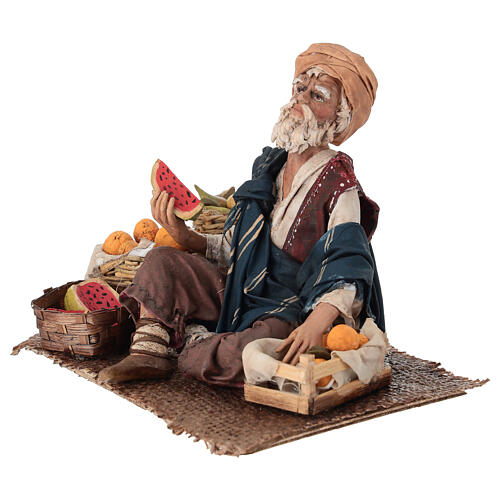 Vendedor de fruta sentado belén 18 cm Angela Tripi terracota 3