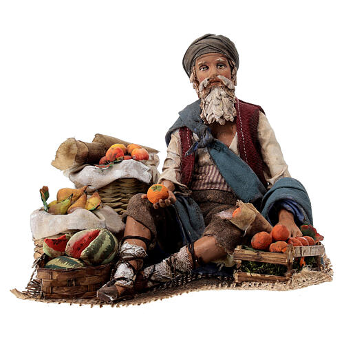 Fruit seller sitting in terracotta, 18 cm Angela Tripi nativity scene 1