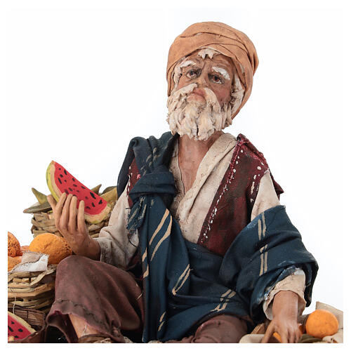 Fruit seller sitting in terracotta, 18 cm Angela Tripi nativity scene 2