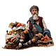 Fruit seller sitting in terracotta, 18 cm Angela Tripi nativity scene s1