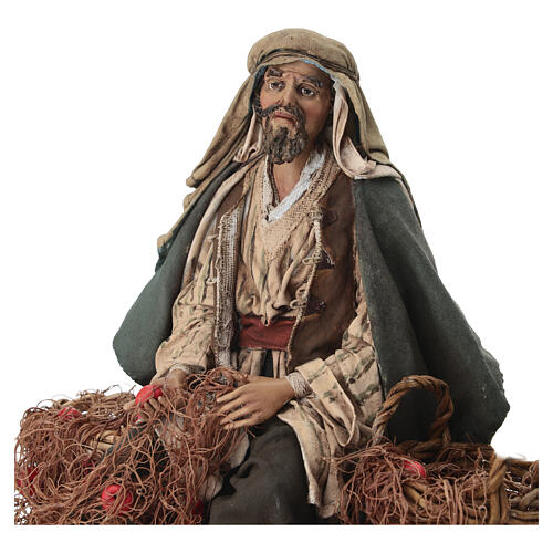 Seated fisherman 30 cm Angela Tripi terracotta 3