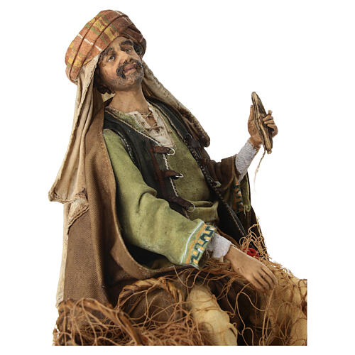 Seated fisherman 30 cm Angela Tripi terracotta 2