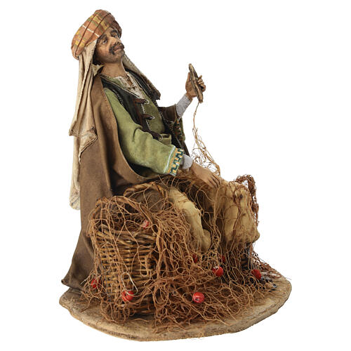 Seated fisherman 30 cm Angela Tripi terracotta 3