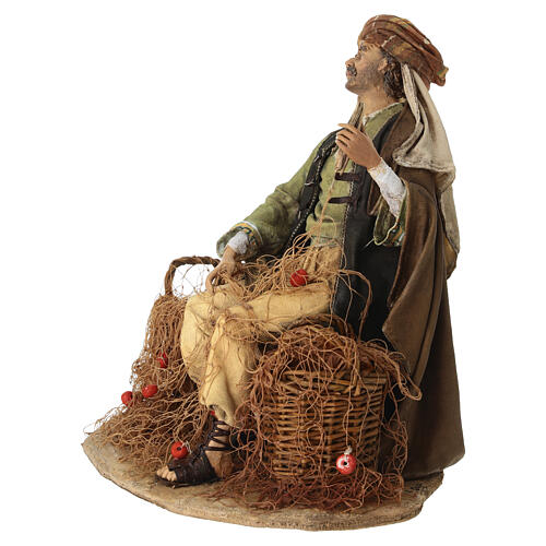 Seated fisherman 30 cm Angela Tripi terracotta 4