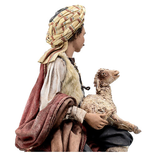 Shepherd sitting with a sheep for terracotta Angela Tripi's Nativity Scene of 30 cm 6