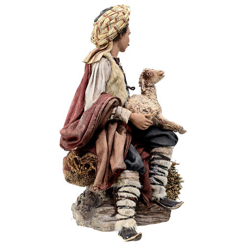 Shepherd sitting with a sheep for terracotta Angela Tripi's Nativity Scene of 30 cm 7