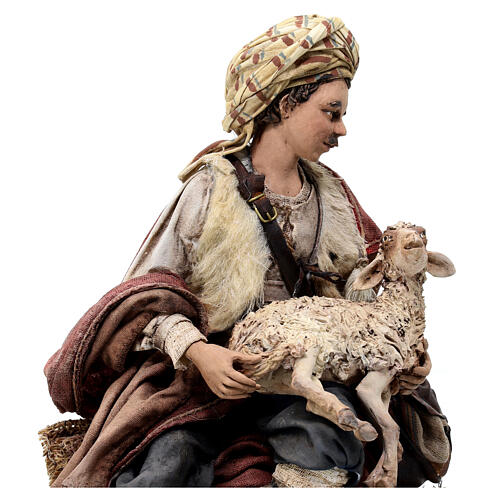 Shepherd sitting with sheep 30 cm terracotta Angela Tripi 4