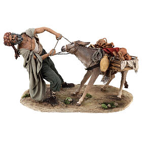 Shepherd pulling the donkey figure Angela Tripi terracotta 30 cm