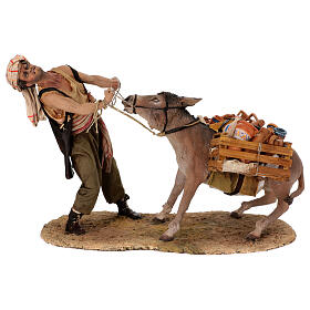 Shepherd pulling the donkey figure Angela Tripi terracotta 30 cm