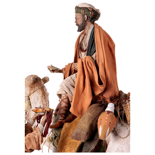 Shepherd on a camel with woman offering him food for terracotta Angela Tripi's Nativity Scene of 30 cm 3