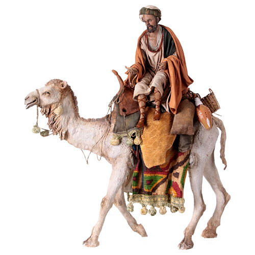 Shepherd on a camel with woman offering him food for terracotta Angela Tripi's Nativity Scene of 30 cm 5