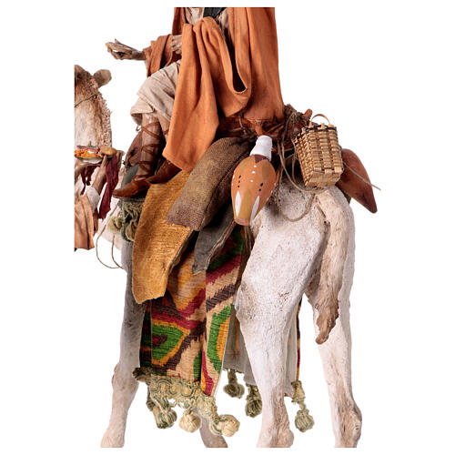 Shepherd on a camel with woman offering him food for terracotta Angela Tripi's Nativity Scene of 30 cm 13