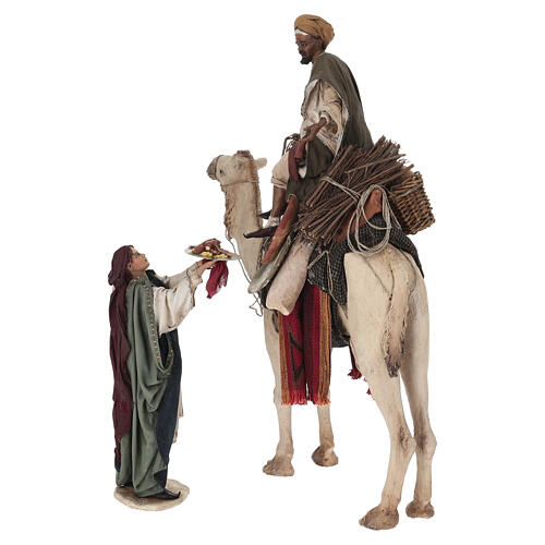 Shepherd on a camel with woman offering him food for terracotta Angela Tripi's Nativity Scene of 30 cm 7