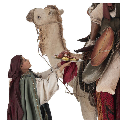 Shepherd on a camel with woman offering him food for terracotta Angela Tripi's Nativity Scene of 30 cm 9