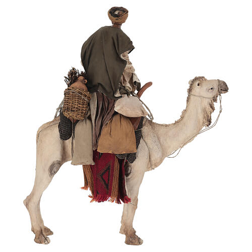 Shepherd on a camel with woman offering him food for terracotta Angela Tripi's Nativity Scene of 30 cm 16