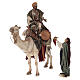 Shepherd on a camel with woman offering him food for terracotta Angela Tripi's Nativity Scene of 30 cm s1