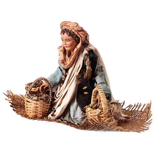 Young man on his knees with baskets, Angela Tripi's Nativity Scene of 13 cm 5