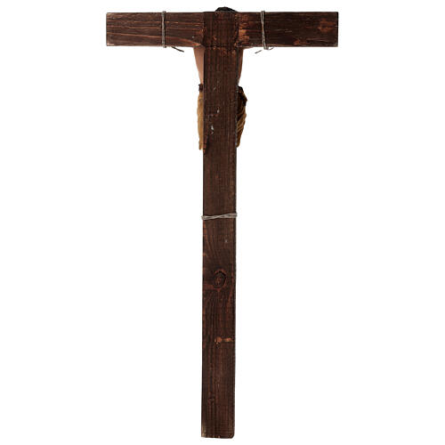 Gekreuzigter Schächer – Terrakottafigur auf Holzkreuz für eine 30 cm Figuren-Serie von Angela Tripi 15