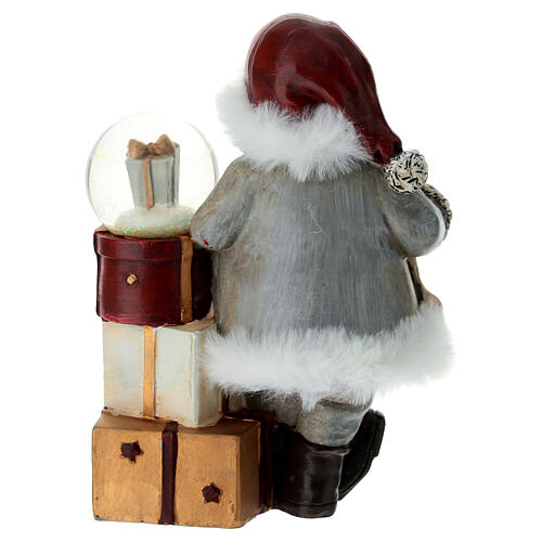 Santa Claus with gifts and glass globe, 8 in 5
