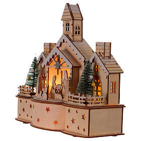 Church with LED Nativity snowy background battery-powered, 30x15x30 cm