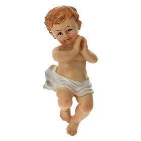 Jesuskind aus bemaltem Resin – Länge 12 cm