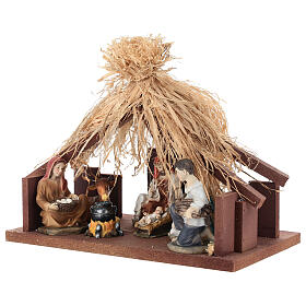 Cabane avec toit en paille et Nativité 25 cm