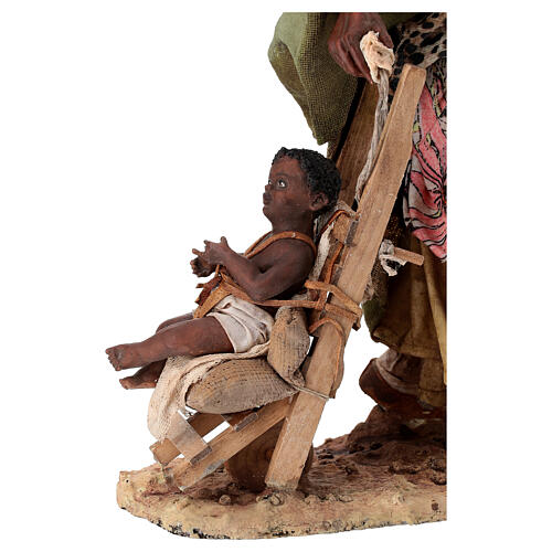 Mulher negra com carrinho de bebê 30 cm Angela Tripi 7