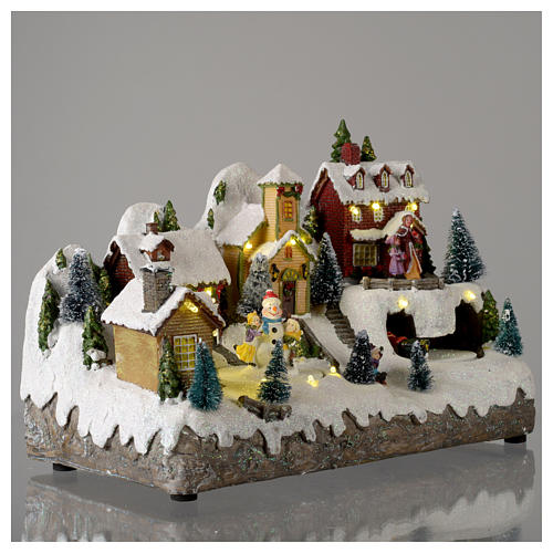 Village de Noël avec bonhomme de neige en mouvement 25x35x15 cm 4