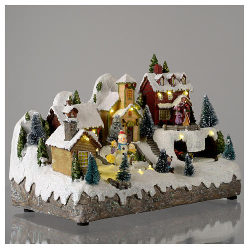 Villaggio natalizio con pupazzo di neve in movimento 25x35x15 cm 4