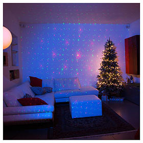 Christmas lights laser projector for interiors with Christmas decorations