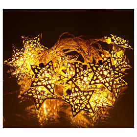 Guirlandes lumineuses de Noël: Chaîne 20 led blanc chaud étoiles or usage intérieur Guirlandes lumineuses de Noël: Chaîne 20 led blanc chaud étoiles or usage intérieur