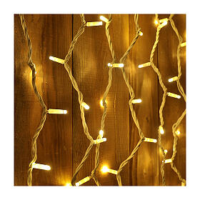 Extendable curtain with 100 warm white Jumbo LED lights