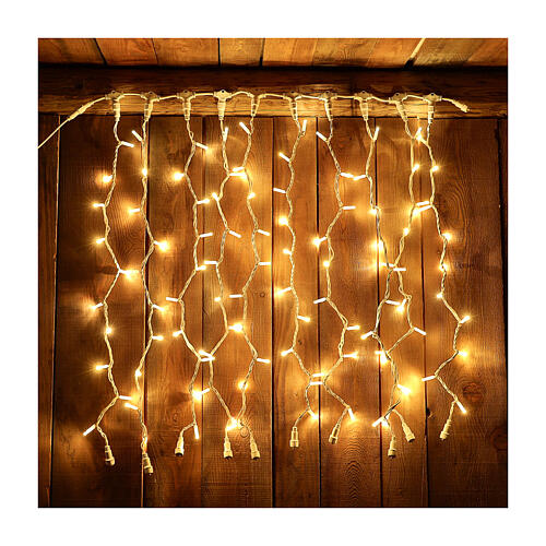 Extendable curtain with 100 warm white Jumbo LED lights 1