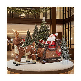 Babbo Natale sulla slitta con renna 90 LED luce fredda acrilico int est 50x85x35 cm