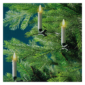 Set of 10 warm white battery-operated LED candles with remote control and internal Christmas tree