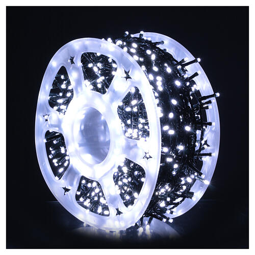 Chaîne lumineuse 1200 LEDs blanc froid bobine avec enrouleur 60 m int/ext 1