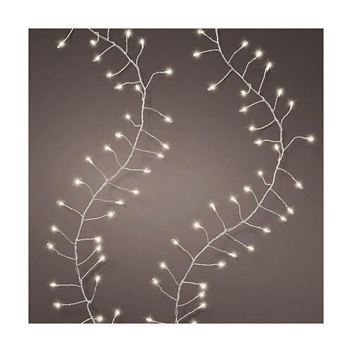Filo di luci intermittenti bianco caldo 960 microled 12m int est 1