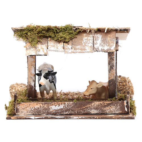 Cows in roofed barn for nativity scene 1