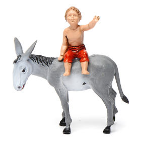 Boy on donkey 10x10x5 cm for Nativity Scene 10 cm