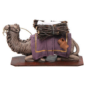 Lying camel with wood faggot for Nativity 14 cm, terracotta