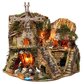Illuminated nativity setting with stable, houses and mill 42x59x35cm