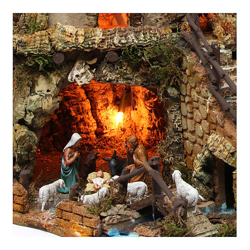Illuminated nativity setting with stable, houses and mill 42x59x35cm 2