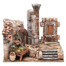 Casas, ambientaciones y tiendas: Aldea con columna y banquete belén 28x30x20 cm