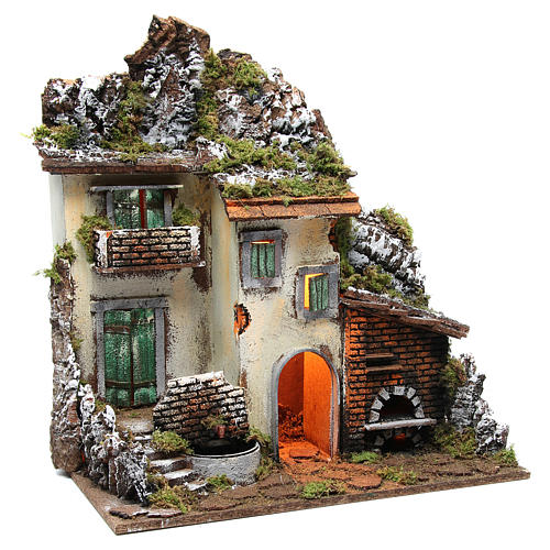 Illuminated village with stable, fountain and oven 55x50x35cm 3