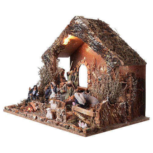 Nativity stable with moving figurines of 15cm, illuminated 46x57x38cm 3
